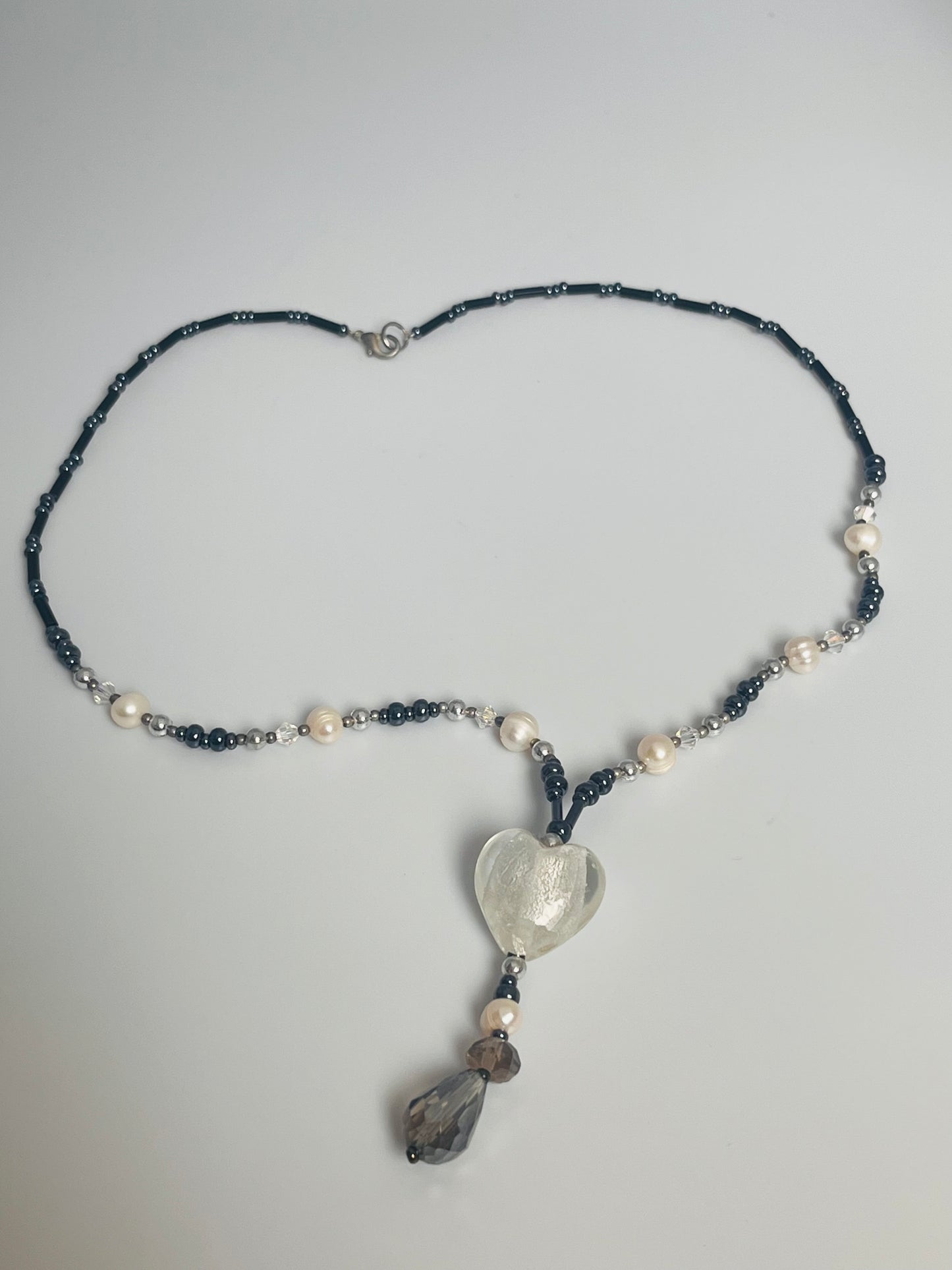 Smykke med hjertedetalj