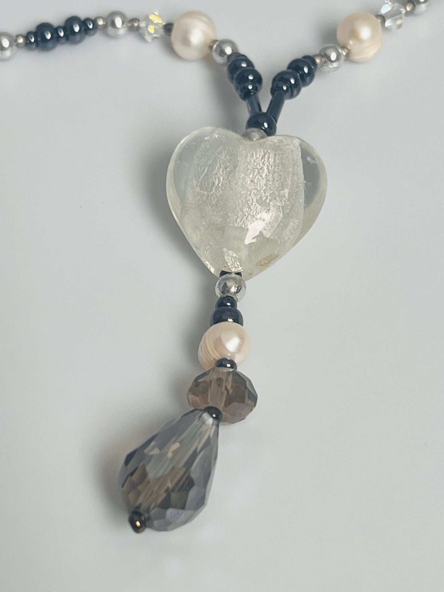 Smykke med hjertedetalj