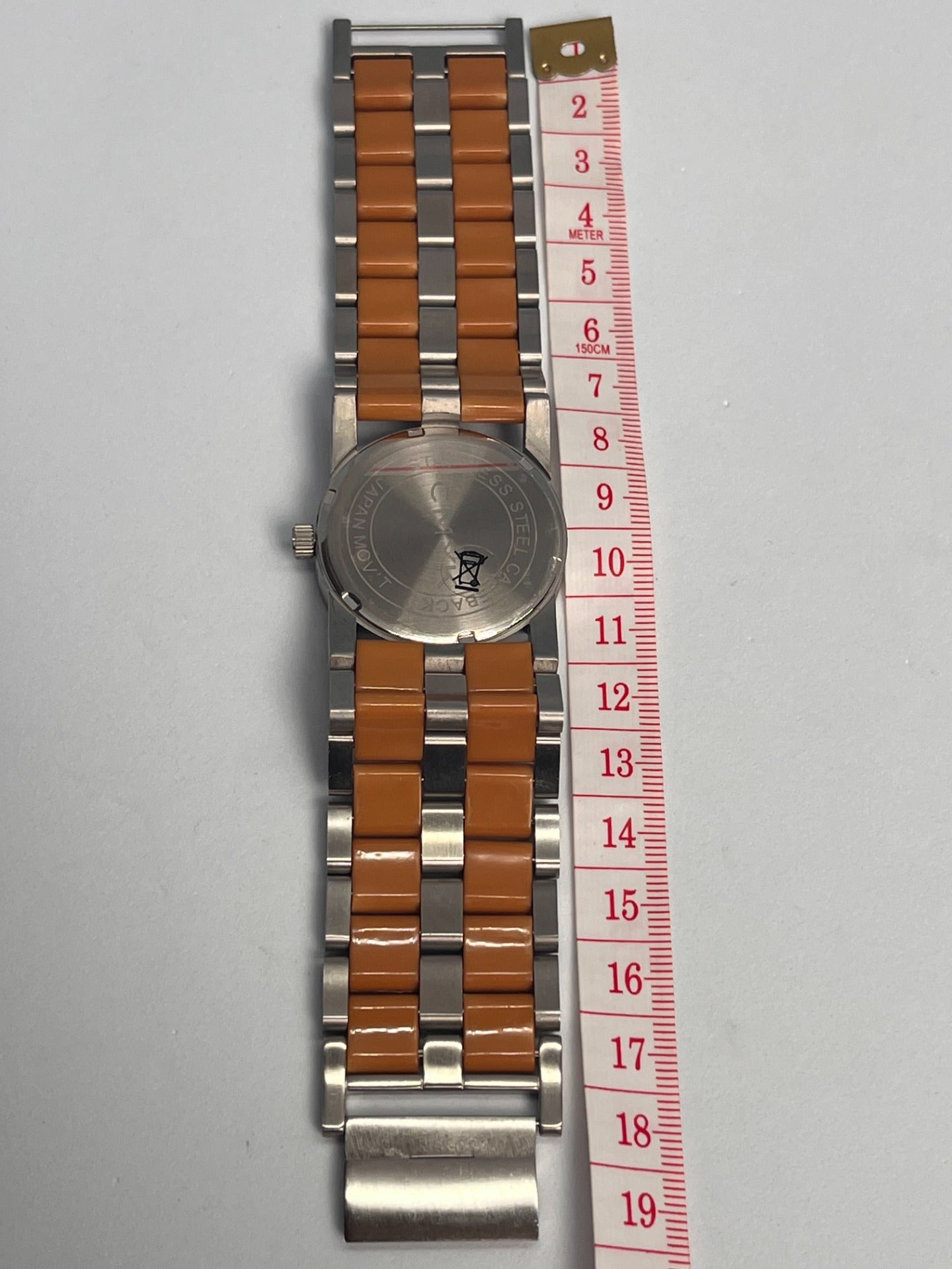 CMYK- STAINLESS STEEL- sølv og konjakkfarge.