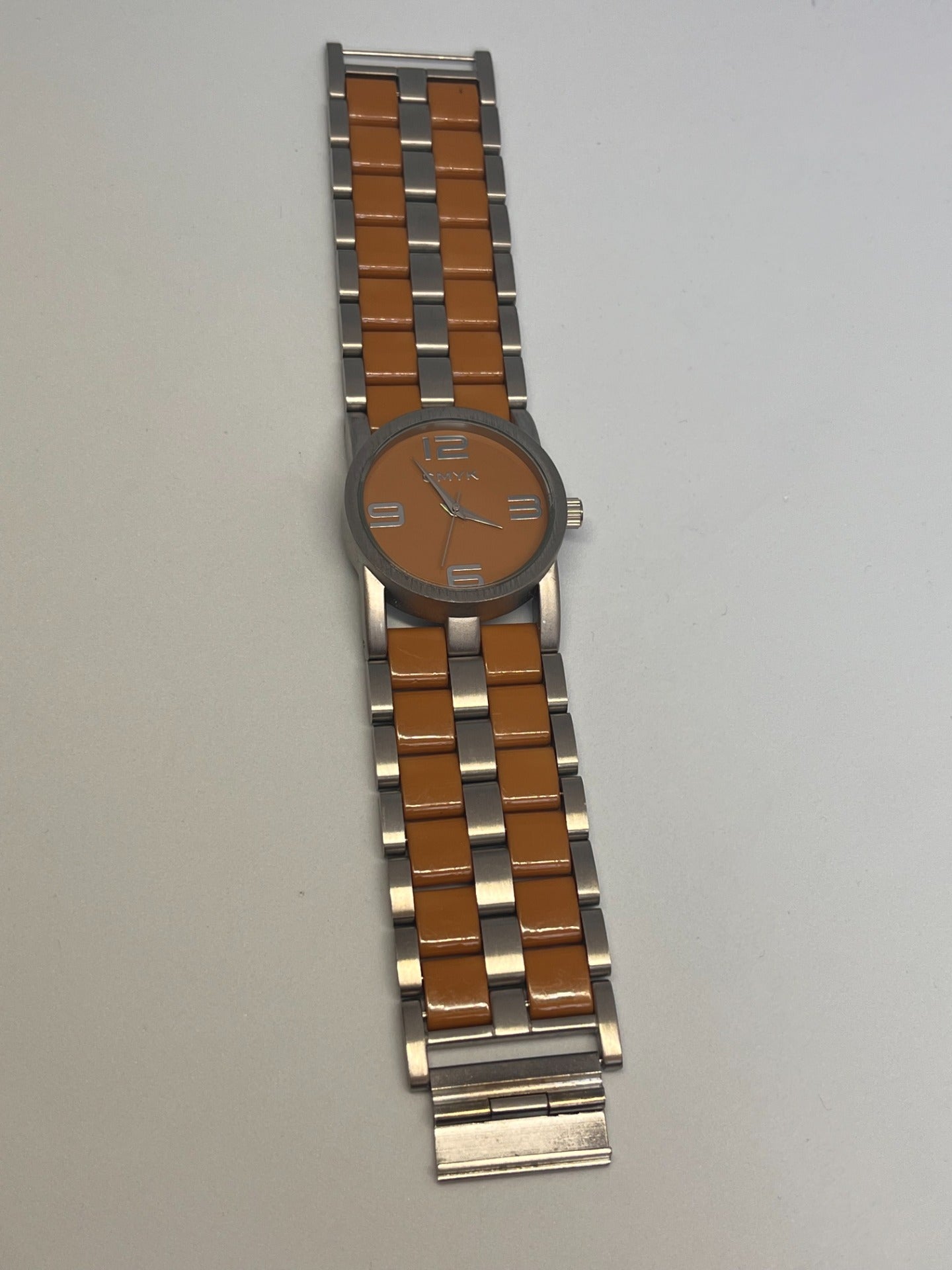 CMYK- STAINLESS STEEL- sølv og konjakkfarge.